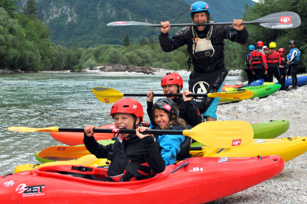 Happy kids - happy parents! Family kayaking Soča river, Bovec, Slovenia. - @dksport.si