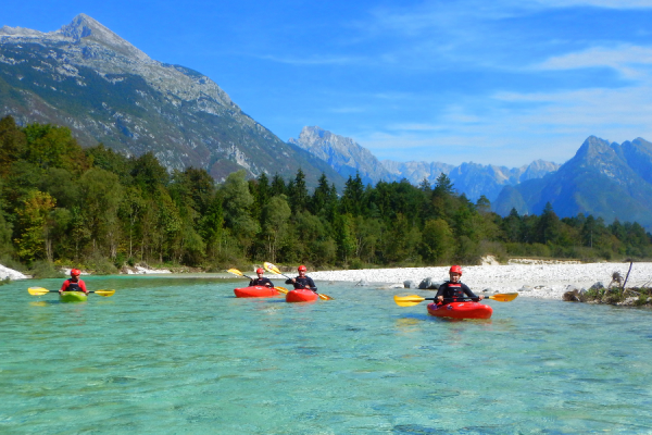 Beginner friendly kayaking in Soca Valley, Bovec. Guided kayak tours on Soca. - @dksport.si