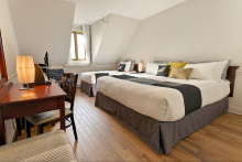 1 lit King et 1 lit simple - Vue fleuve - Hôtel Cap-aux-Pierres