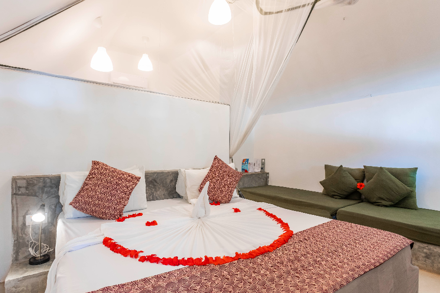 Double bed & sofa - Our Zanzibar Hotel Group