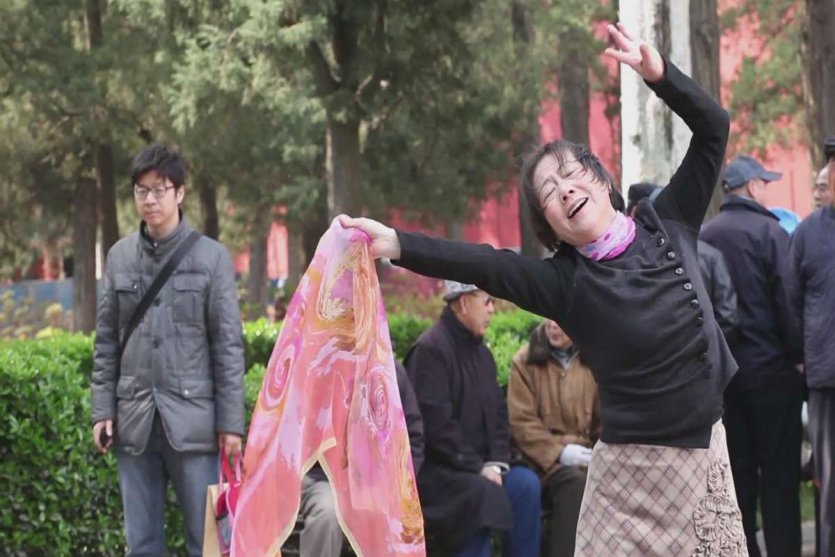 - © © Hu Xiangqian, The Woman in Front of the camera 2015