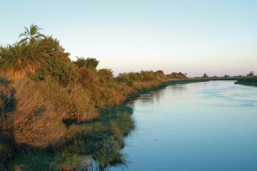 Lever de soleil sur le fleuve Okavango. - Marie Gousseff / Julien Marchais