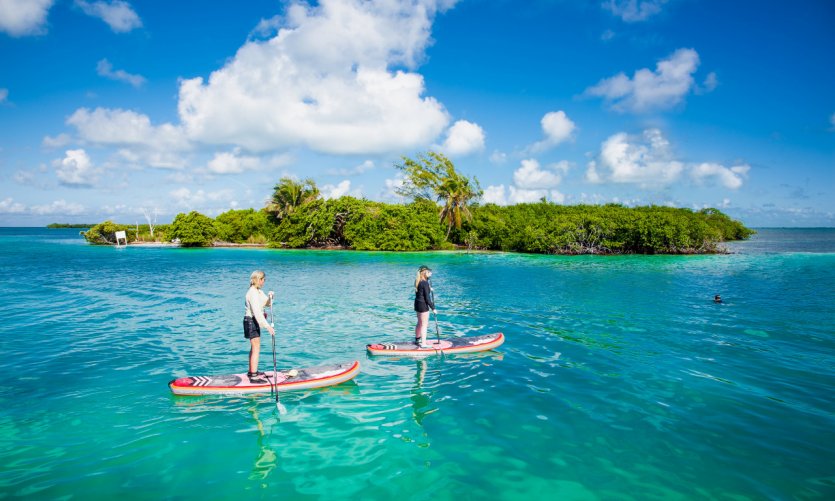 Paddle on the waters of Caye Caulker. Paddle on the waters of Caye Caulker.