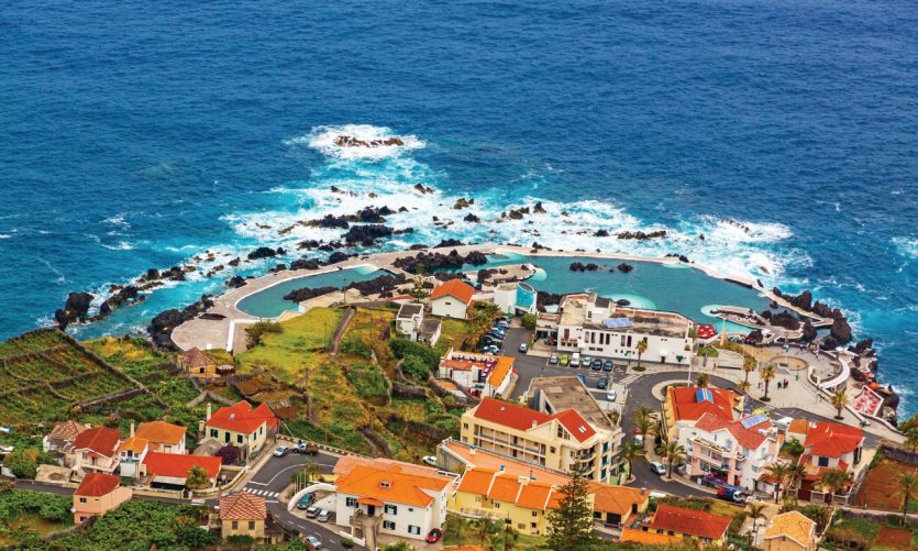 View of Porto Moniz and its natural pools. View of Porto Moniz and its natural pools.