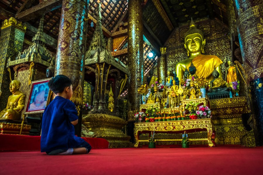 Bouddha du temple Vat Xieng Thong à Luang Prabang. ISSARET YATSOMBOON - Shutterstock.Com