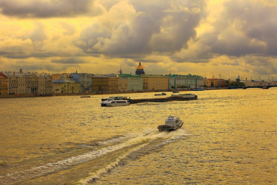 Neva River, Hermitage and Russian flag, St. Petersburg skyline dramatic panorama. agustavop - iStockphoto