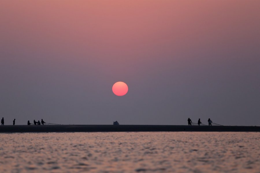 Coucher de soleil sur la plage de Kuakata. Swapan Photography - Shutterstock.com